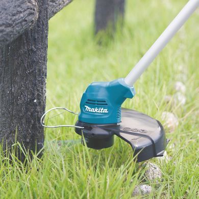 Makita Триммер садовый UR100DWAE аккумуляторный CXT, 10.8В 2х2ач, 230мм, 3 кг UR100DWAE фото