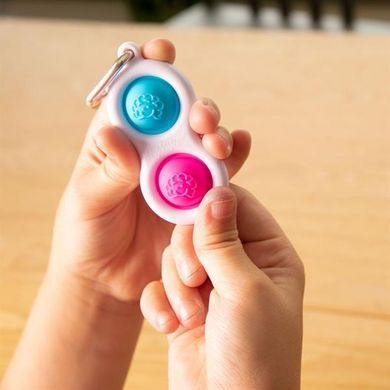 Брелок-антистрес Fat Brain Toys Simpl Dimpl Кнопки 4 кольори в асорт. (F2111ML) dt_13656 фото