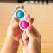 Брелок-антистрес Fat Brain Toys Simpl Dimpl Кнопки 4 кольори в асорт. (F2111ML) dt_13656