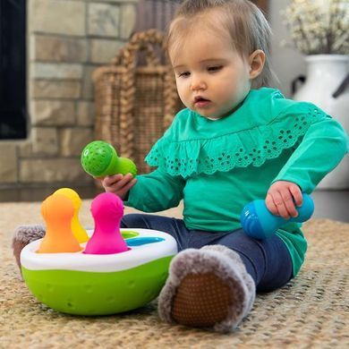Сортер-балансир Fat Brain Toys Spinny Pins Неваляшки (F248ML) dt_13666 фото