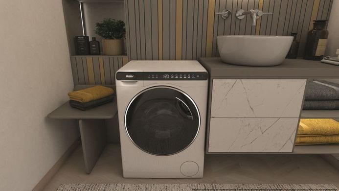 Haier Пральна машина фронтальна, 5кг, 1000, A+++, 44см, дисплей, інвертор, люк чорний, висота 70см, білий (372639) HW50-BP12307 фото