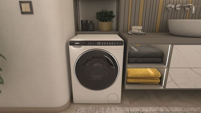 Haier Пральна машина фронтальна, 5кг, 1000, A+++, 44см, дисплей, інвертор, люк чорний, висота 70см, білий (372639) HW50-BP12307 фото