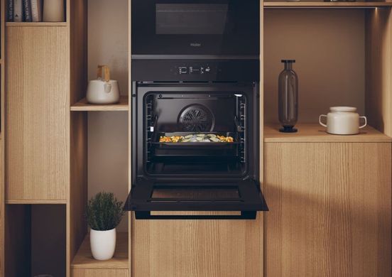 Haier Духовой шкаф электрический, 78л, A++, дисплей, конвекция, пиролиз, телескопические направляющие, черный H6ID25G3YTB фото