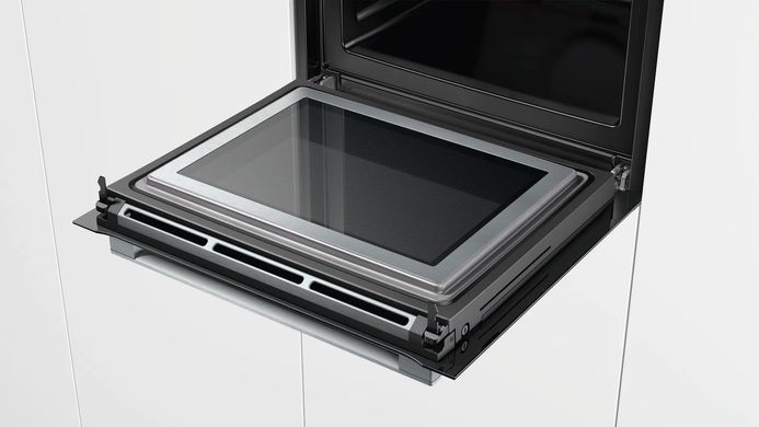 Bosch Духовой шкаф электрический, 67л, A+, дисплей, конвекция, пиролиз, ф-ция СВЧ, черный HMG6764B1 фото