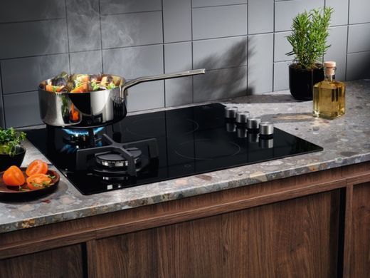 Electrolux Варильна поверхня комбінована (2 газ + 2 склокерам.), 60см, чавун, чорний (367113) EGE6172NOK фото