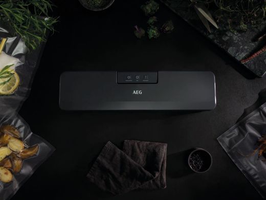 Вакууматор AEG для рулонів, пакетів і контейнерів, 80Вт, 30см, електронне керування, +10 пакетів, пластик, чорний (389281) VS4-1-4AG фото