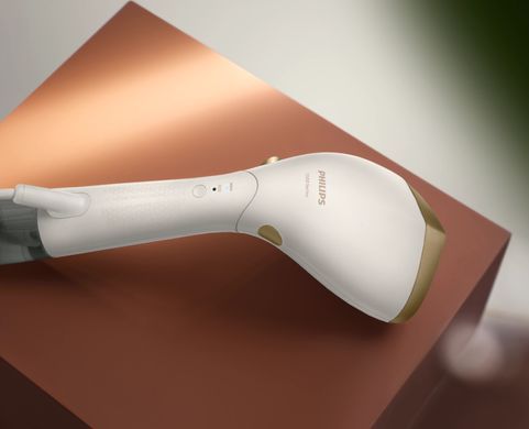 Отпариватель Philips компактный Series 7000, 1500Вт, 100 и 200мл, паровой удар -28гр, перчатка, чехол, нерж. сталь, белый STH7030/10 фото
