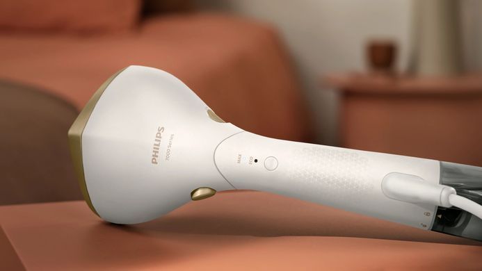 Отпариватель Philips компактный Series 7000, 1500Вт, 100 и 200мл, паровой удар -28гр, перчатка, чехол, нерж. сталь, белый STH7030/10 фото